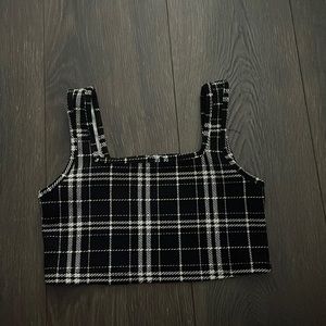 Shein top. It’s a kid size 10y but it would fit someone who is like xxs adult.